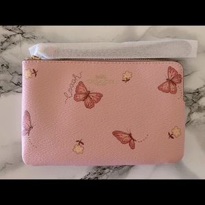 Coach butterfly and flower wristlet